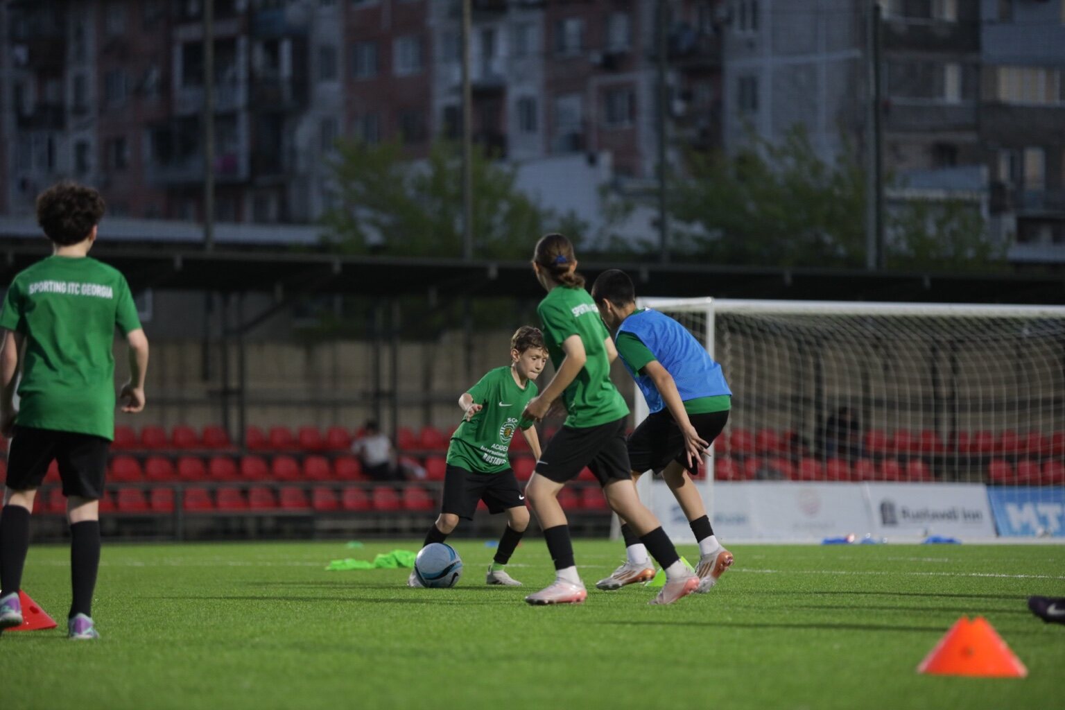 Sandro Abesadze dribbling through players during a Sporting ITC Georgia session